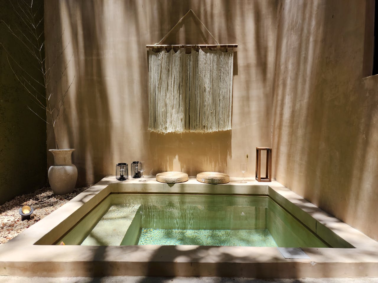 A serene indoor spa setting with natural light and minimalist decor, perfect for relaxation.